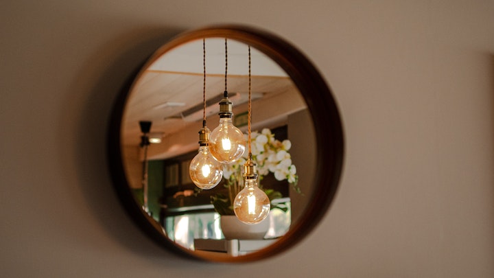 7 razões para decorar sua casa com espelhos redondos
